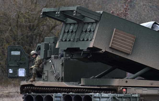 A US serviceman sits in the cabin of an M-20 MLRS at the Grafenwöhr military field in southern Germany on March 4, 2020. 