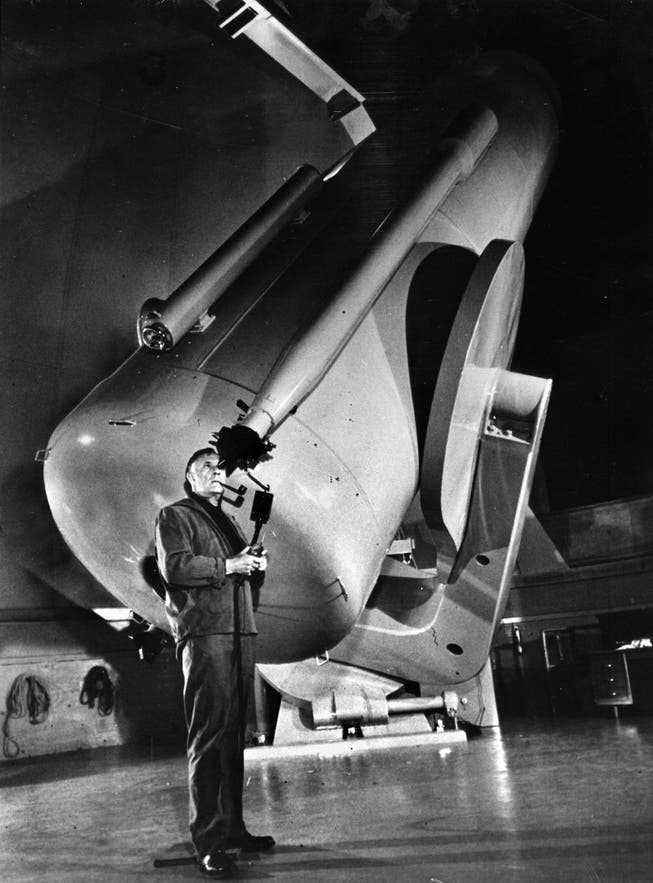 American astronomer Edwin Hubble at the Palomar Observatory in California.