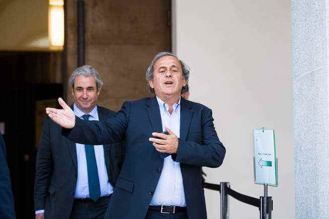 Michel Platini, former head of the European Football Association (Uefa), leaves the Federal Criminal Court after the first day of the hearing. 
