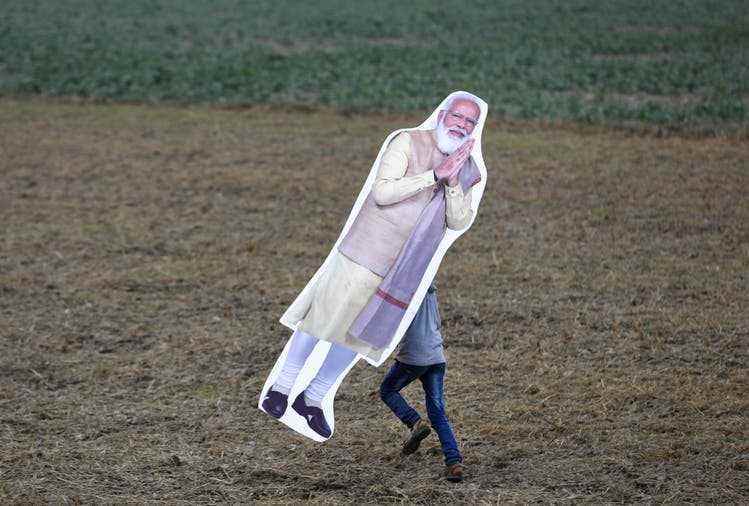 A cardboard Narendra Modi at an election rally.  The Hindu nationalist's election was also a backlash against the Indian elite. 