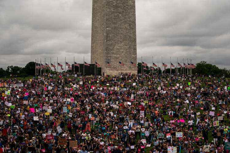 Pro-choice activists demonstrate at the Washington Monument before a march to the Supreme Court on May 14, 2022. 