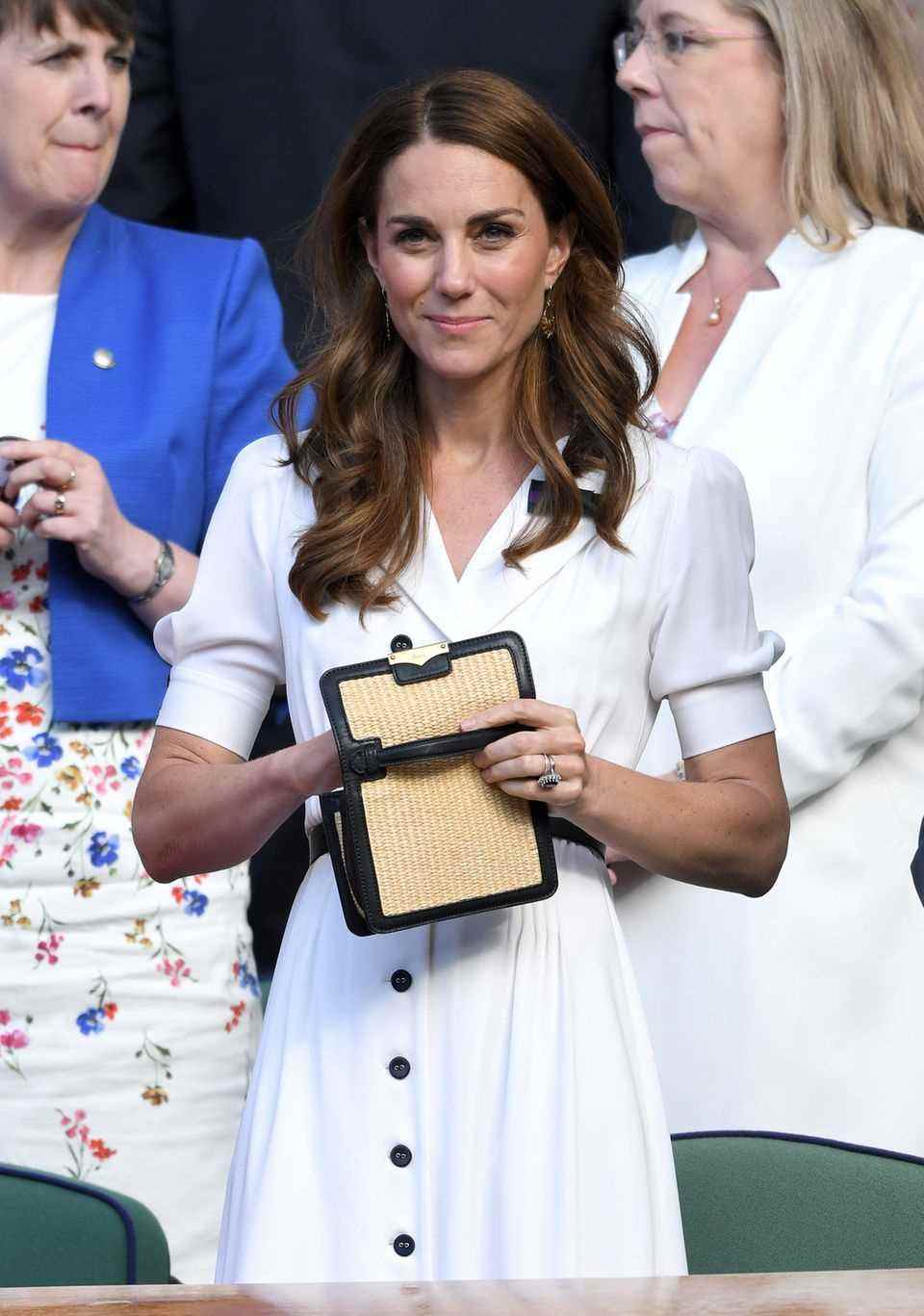 Duchess Catherine with one "Wiccan Bag" by Alexander McQueen. 