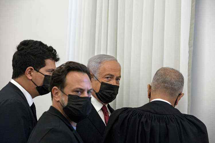 Opposition leader Benjamin Netanyahu has to answer before the Jerusalem district court on alleged corruption. 