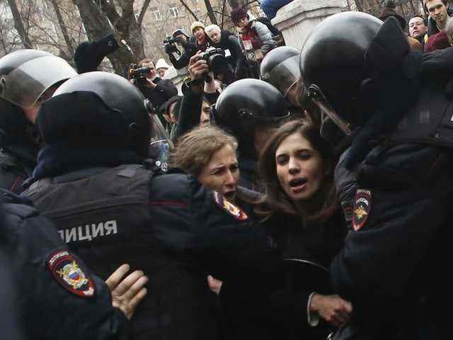 Again and again, Pussy Riot have been arrested during their actions, like here in Moscow in 2014.