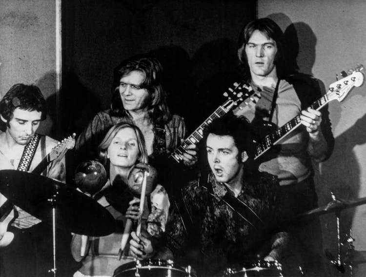 Paul McCartney with his second wife Linda Eastman and his second band Wings. 