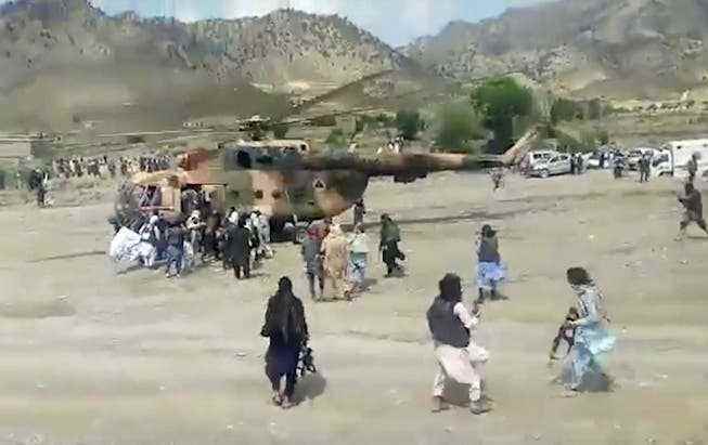 The state news agency Bakhtar shows a government helicopter evacuating the injured from Paktika.