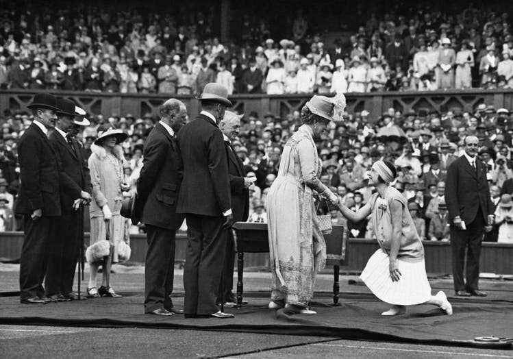 King George V and Queen Mary at a ceremony in 1926 with Suzanne Lenglen (right).