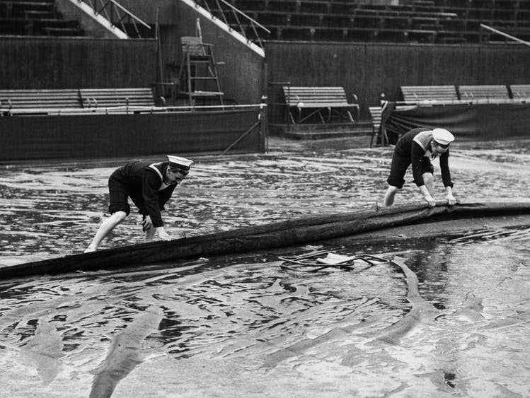 In 1947, rain is still the great natural enemy.  Center Court has only had a closable roof since 2009.
