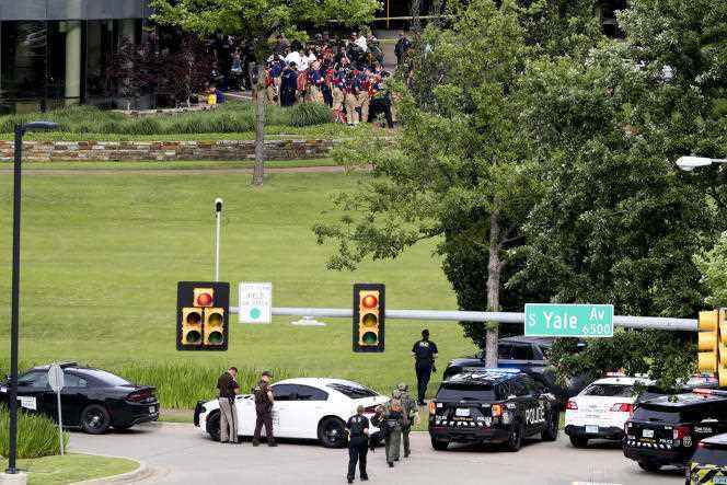Tulsa police and firefighters at the base of the Natalie Medical Building after the shooting.  June 2, 2022.