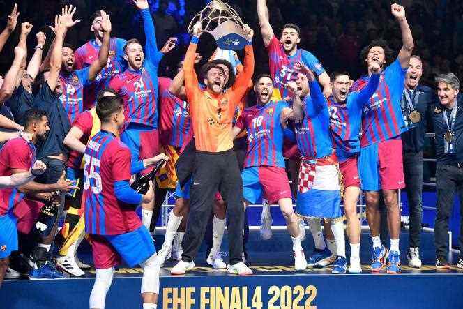 Barcelona players celebrate their Champions League victory against Poland's Kielce, in Cologne on June 19, 2022.