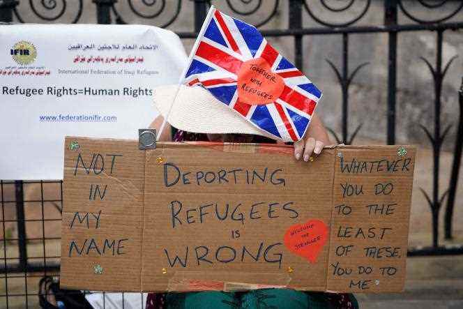 Demonstrators protest against the return to Rwanda by charter plane of asylum seekers, in London, June 13, 2022. 