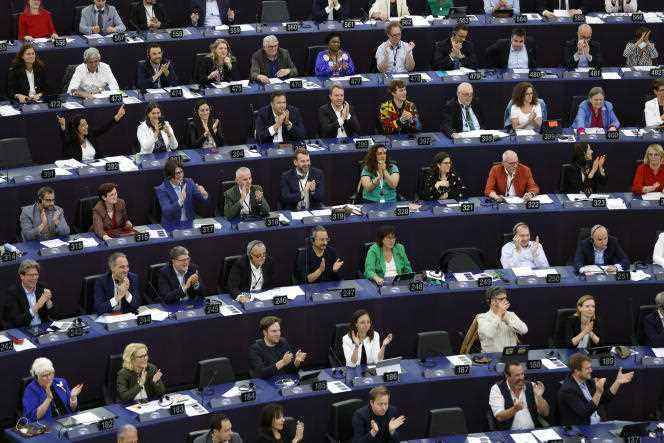 Members of the European Parliament applaud after voting to ban all new heat engines in the European Union from 2035, in Strasbourg, June 8, 2022.
