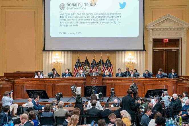 A tweet by President Donald Trump is shown on a screen during the sixth hearing of the House of Representatives Select Committee investigating the January 6 attack on the Capitol, in Washington, DC, June 28, 2022 .