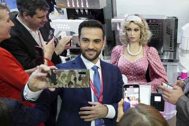 Selfie break with Douniacha, a robot created by the Russian company Promobot, at the International Economic Forum in Saint Petersburg (Russia), June 16, 2022. 