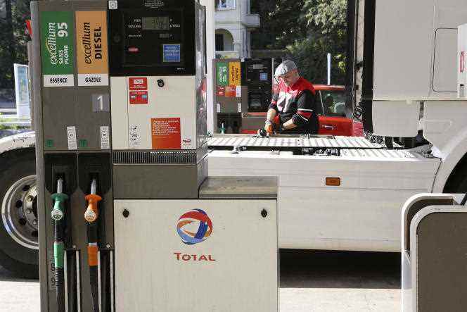 A driver refuels his truck at a gas station in Lucciana (Haute-Corse), February 14, 2022.