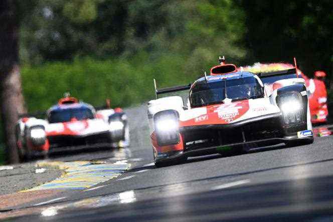 The Toyota n°8 driven by the Swiss Sebastien Buemi (on the right) in front of the n°7 driven by the Briton Mike Conway on the Sarthe circuit during the 90th edition of the 24 hours of Le Mans, Saturday June 11, 2022.