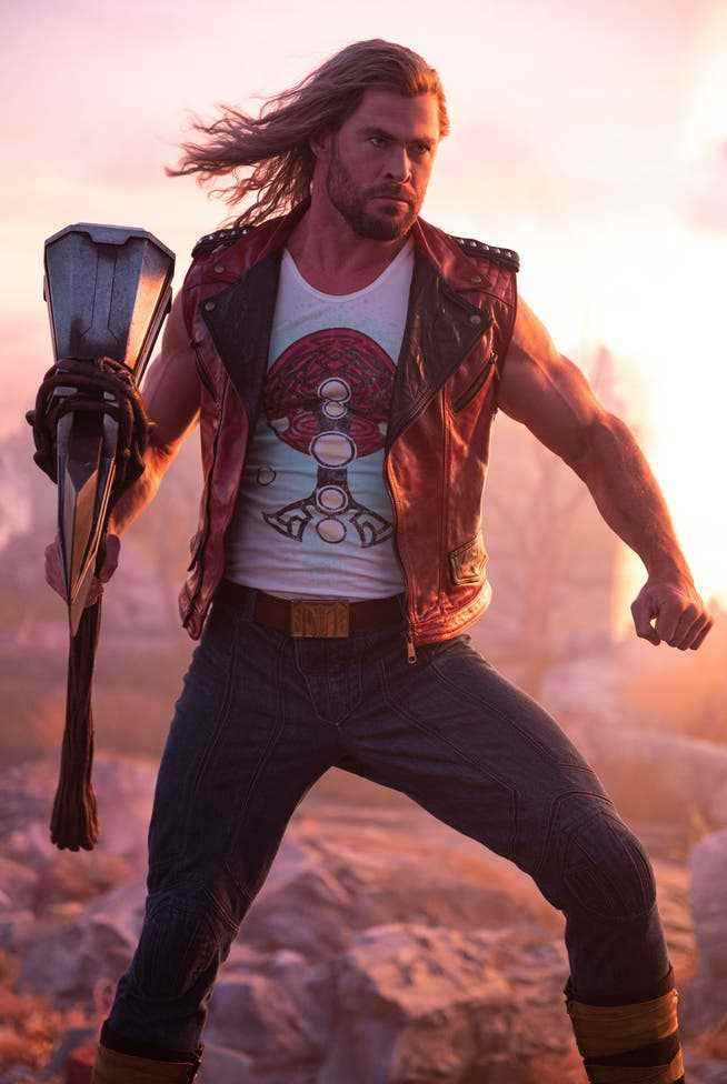 Superhero or Rock Star?  Chris Hemsworth plays Thor again.