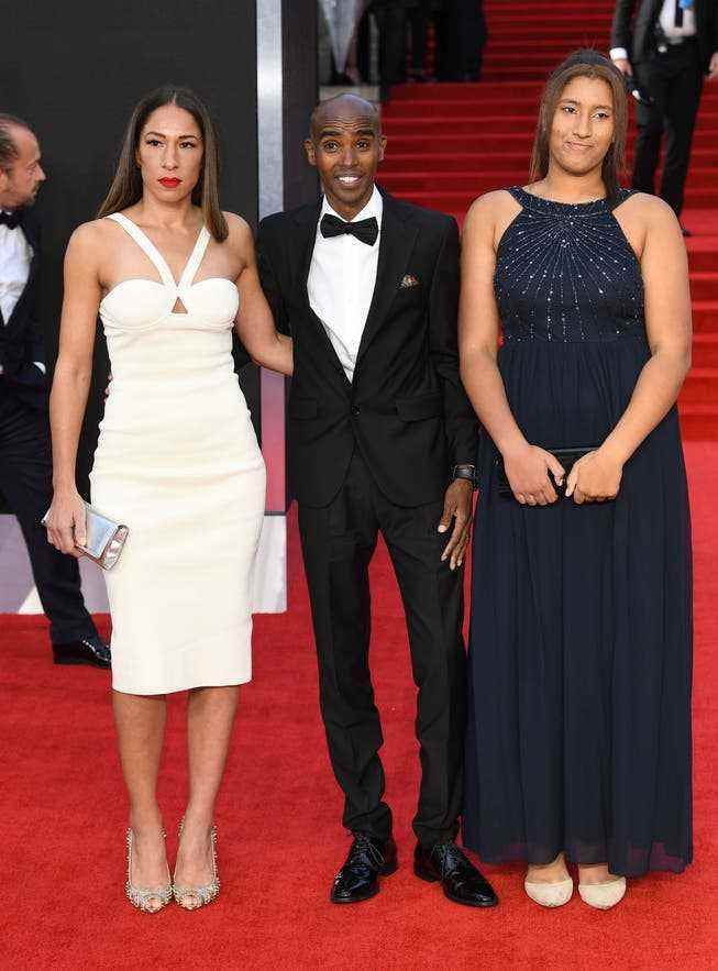 Sir Mo Farah with his wife Tania (left) and eldest daughter Rhianna at the world premiere of 