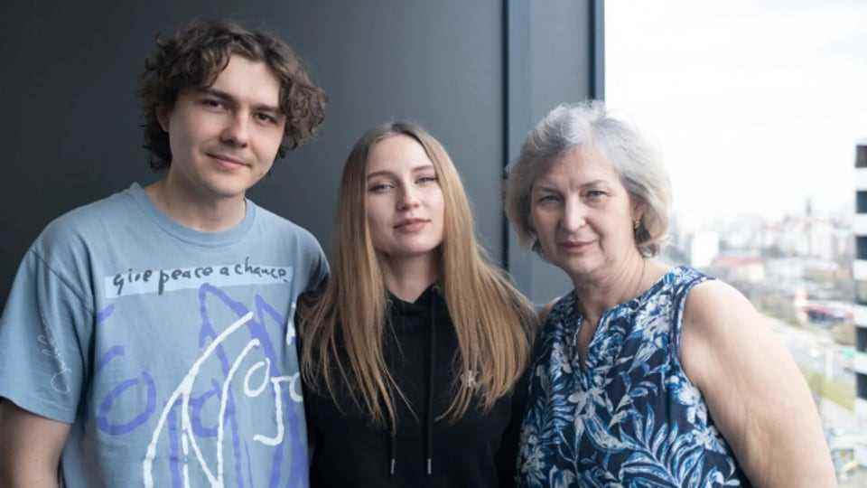 Olga with boyfriend and mother