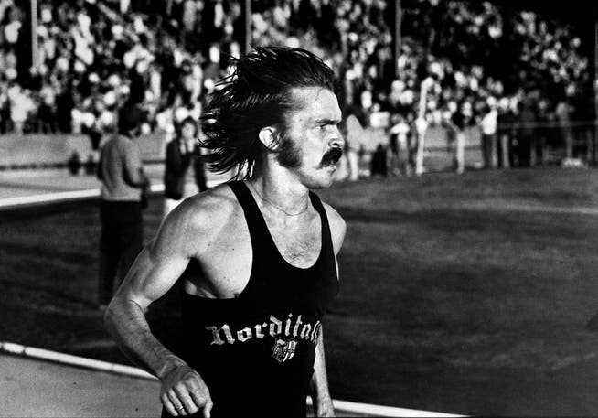 With a mustache and Nike shoes: Steve Prefontaine in his last race.  The following night he drove his gold convertible into a rock and died.