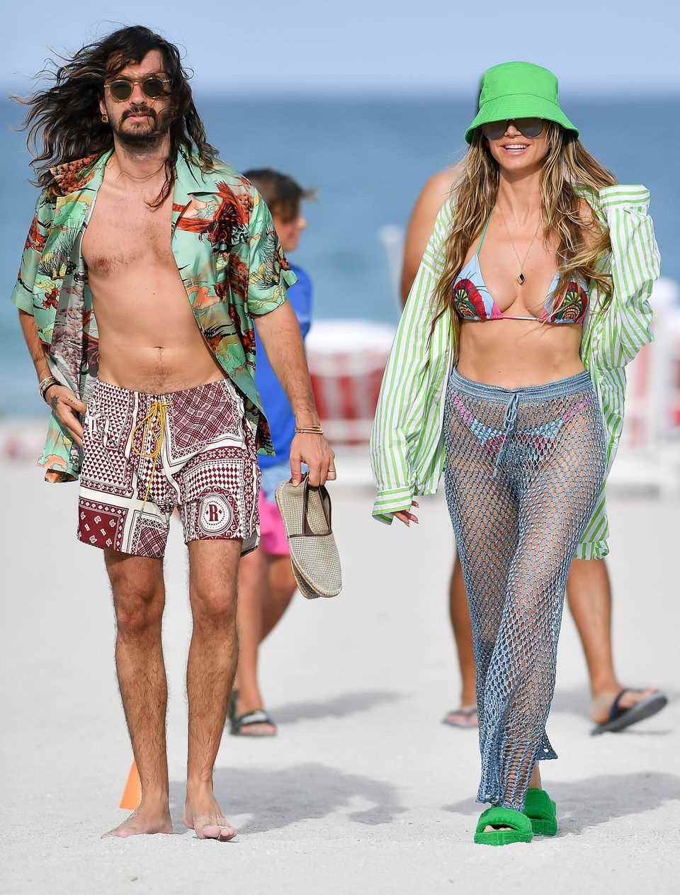 Heidi Klum is trendy with her fishnet pants. 