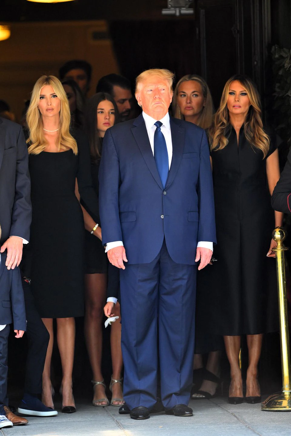 Ivanka, Donald and Melania Trump with other guests at Ivana Trump's funeral.