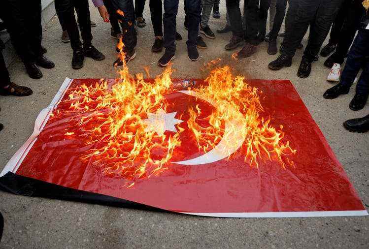 After the death of nine tourists in an artillery attack, angry anti-Turkey protests erupt in numerous Iraqi cities, such as here in Mosul. 