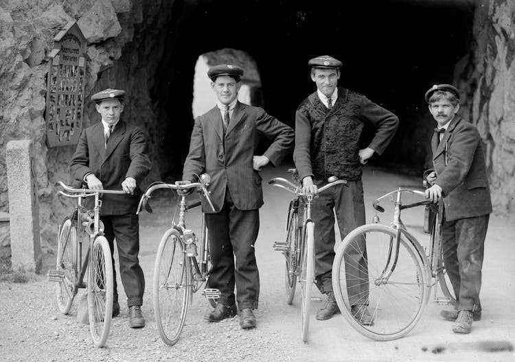 In the 1920s, four boys rode their bicycles along Axenstrasse.  They could be members of a cycling club.