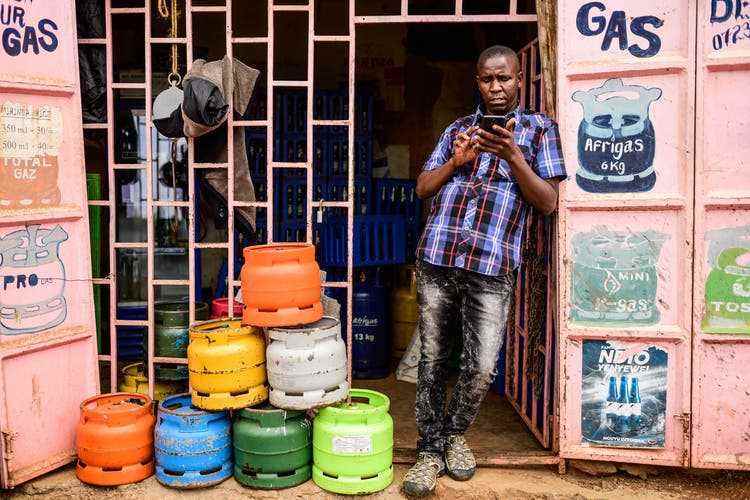 Martin Kivuva earns four to eight francs a day in his shop. 