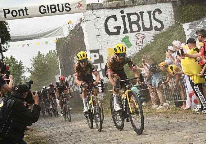 Belgian Tiesj Benoot (left) and Jumbo-Visma leader Slovenian Primoz Roglic (right) during the 5th stage of the Tour de France between Lille and Arenberg Porte du Hainaut on July 6. 