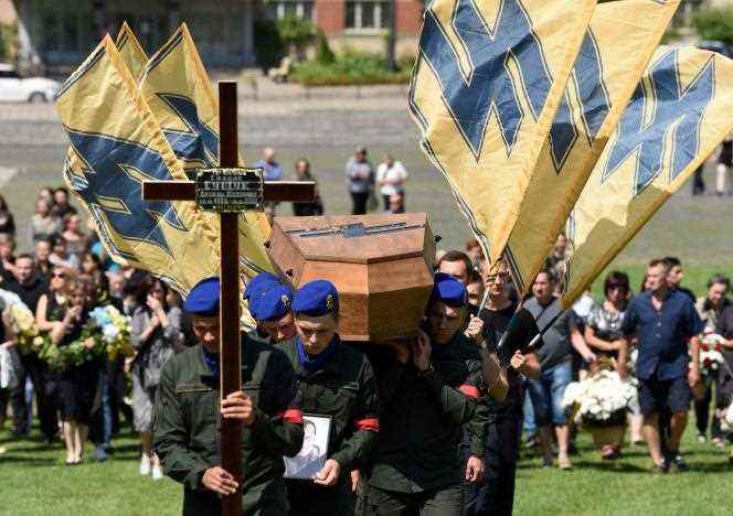 Ukrainian soldiers from the Azov regiment during the funeral of one of their own, in Lviv, Ukraine, July 29, 2022. 