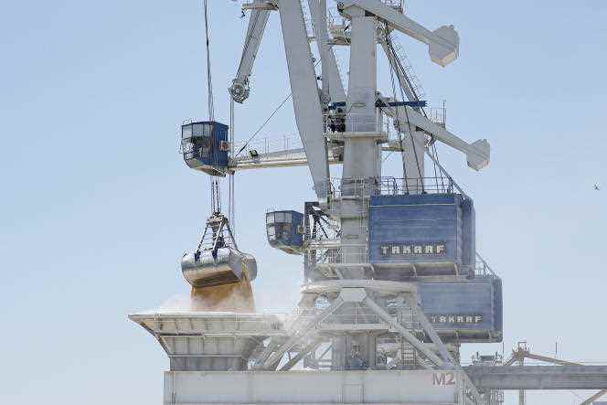 Grain from Ukraine is unloaded from a barge in the port of Constanta, Romania, on the Black Sea, Tuesday, June 21, 2022. 