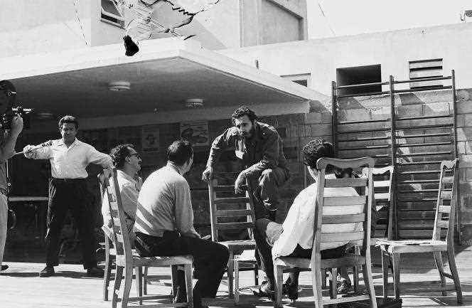 Giangiacomo Feltrinelli (seated left) and Fidel Castro (center) in Cuba, 1963.