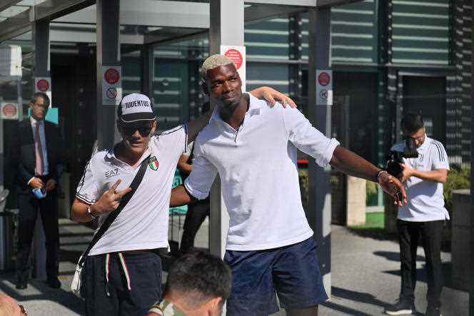 Paul Pogba arrives in Turin on July 9.