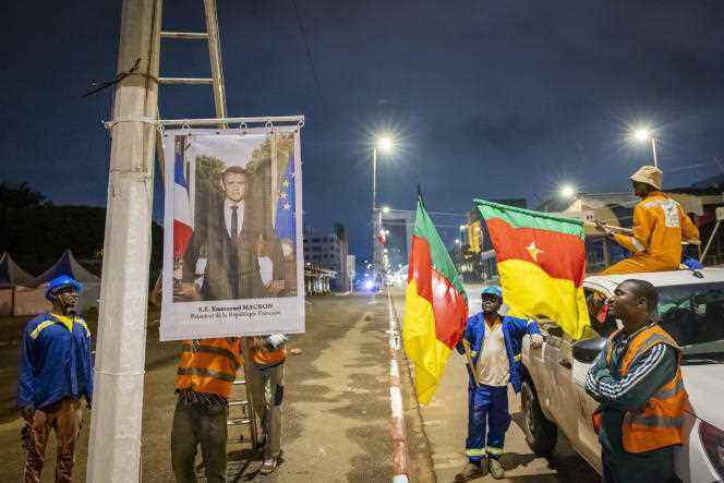 Municipal workers decorate the center of Yaoundé with French and Cameroonian flags on the eve of the official visit of French President Emmanuel Macron, Sunday July 24, 2022.