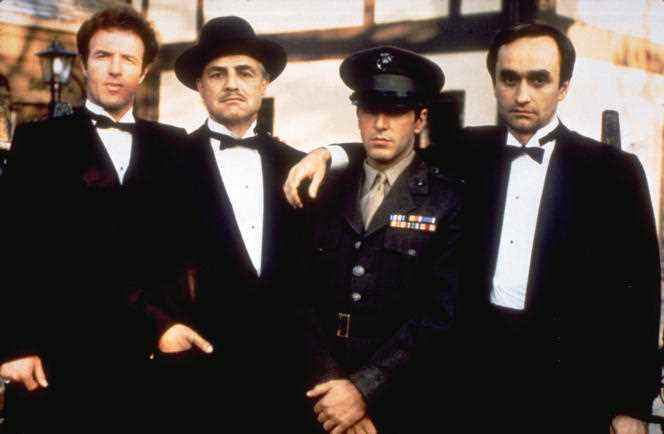 Left to right: James Caan, as Sonny Corleone, Marlon Brando, (Don Vito Corleone), Al Pacino (Michael Corleone) and John Cazale (Fredo Corleone), in the 1972 film 