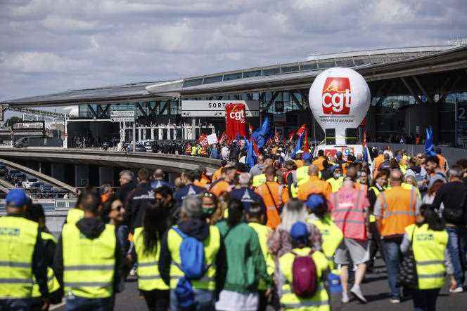 Striking employees demonstrate at Roissy-Charles-de-Gaulle airport on 1 July.  