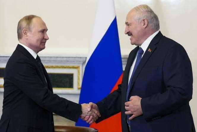 Russian President Vladimir Putin and his Belarusian counterpart Alexander Lukashenko meet in Saint Petersburg, Russia, June 25, 2022.