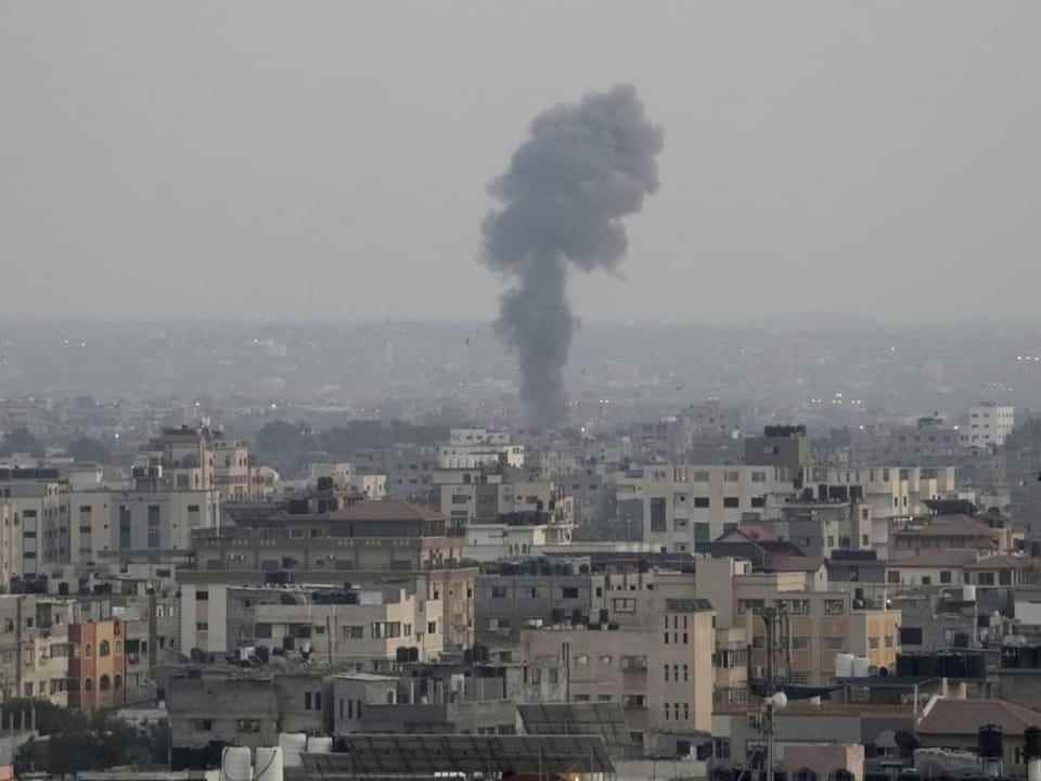 Smoke rises over Gaza after Israeli airstrikes. 