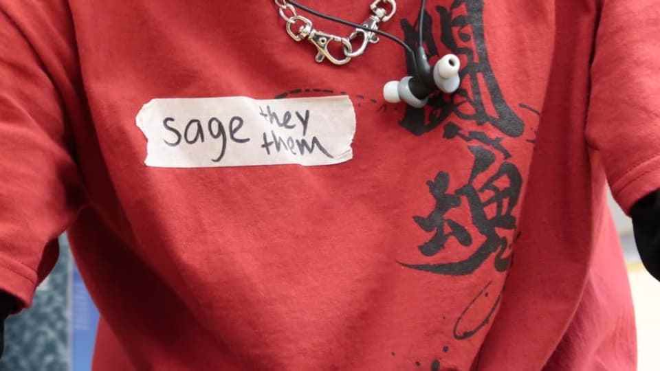 Name tag that reads: Sage, they/them