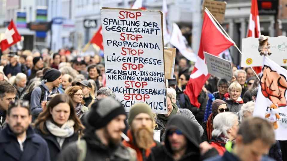 Shield at demonstration with STOP