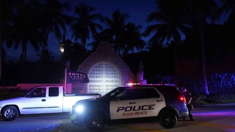 A police car in front of Trump's luxury residence Mar-a-Lago.