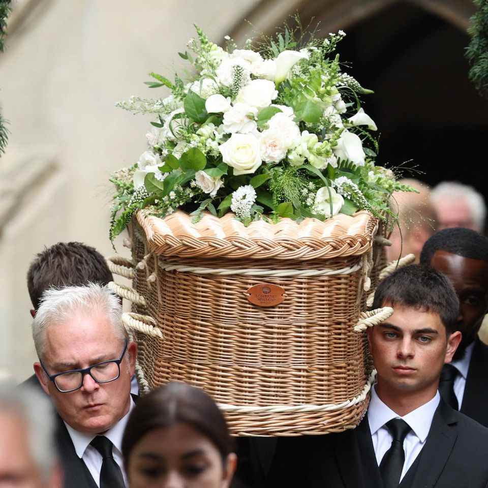 Deborah James' coffin is carried out of the church