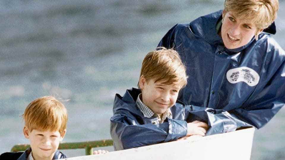 Diana in 1991 with her two sons Harry (7) and William (9) on a boat.