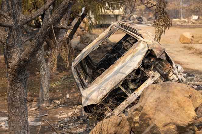 This photo taken on August 2, 2022 shows a charred car in which the bodies of two dead people were discovered, Sunday, in the Klamath National Forest, near Yreka, in northern California.