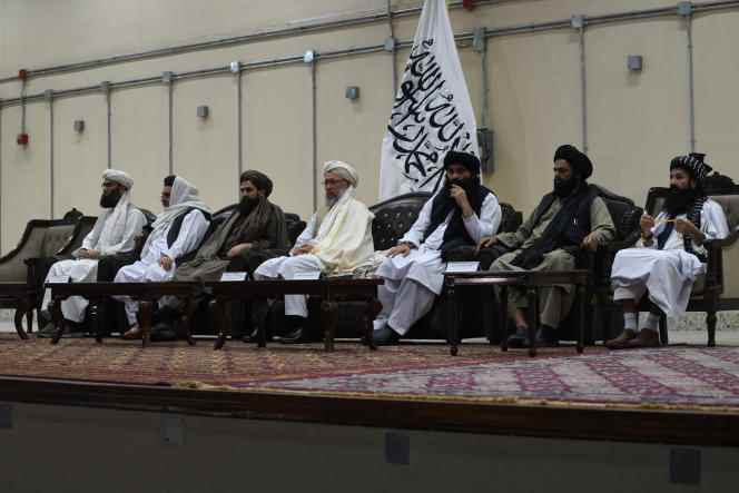 Taliban leaders take part in a conference for the reading of the official decree of the Supreme Leader of the Islamic Emirate of Afghanistan (EIA) on the prohibition of poppy cultivation and all kinds of narcotics, in Kabul, April 3, 2022 . 