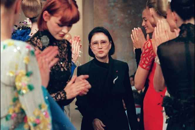 Hanae Mori, applauded by her models, during the presentation of her collection, in Paris, July 21, 1998.