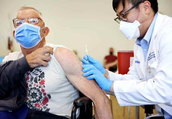 A man gets vaccinated against monkeypox in Los Angeles on August 3, 2022.