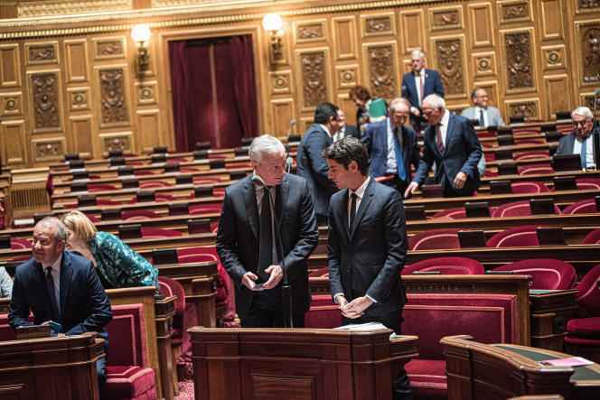 The Minister of Economy Bruno Le Maire discusses with the Minister Delegate in charge of Public Accounts, Gabriel Attal, during the debates around the amending finance bill for 2022 in the Senate, August 1, 2022.