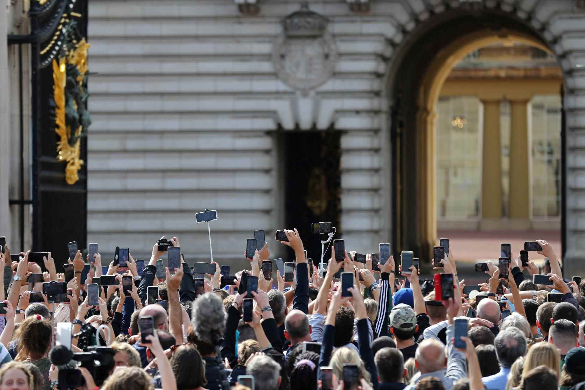Crowds wait for King Charles III, outside Buckingham Palace in London, September 9, 2022.